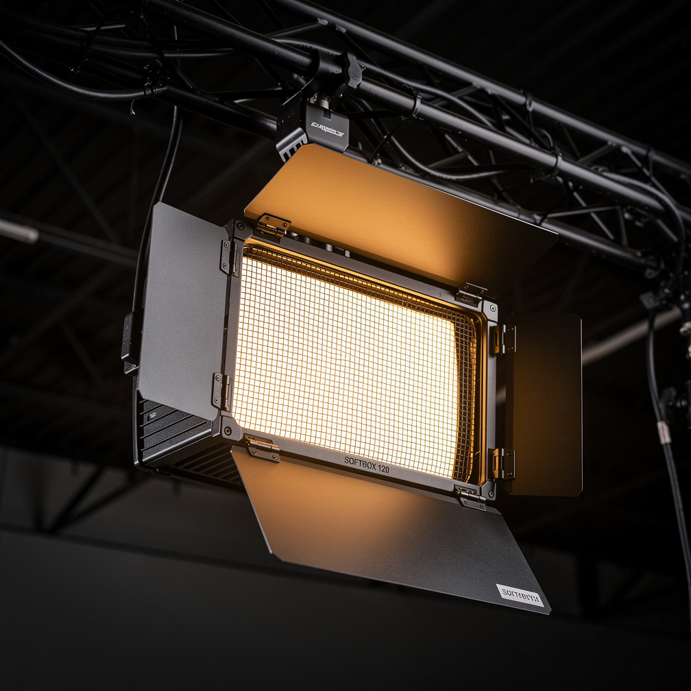 Close-up of a studio softbox light rig mounted on an overhead grid